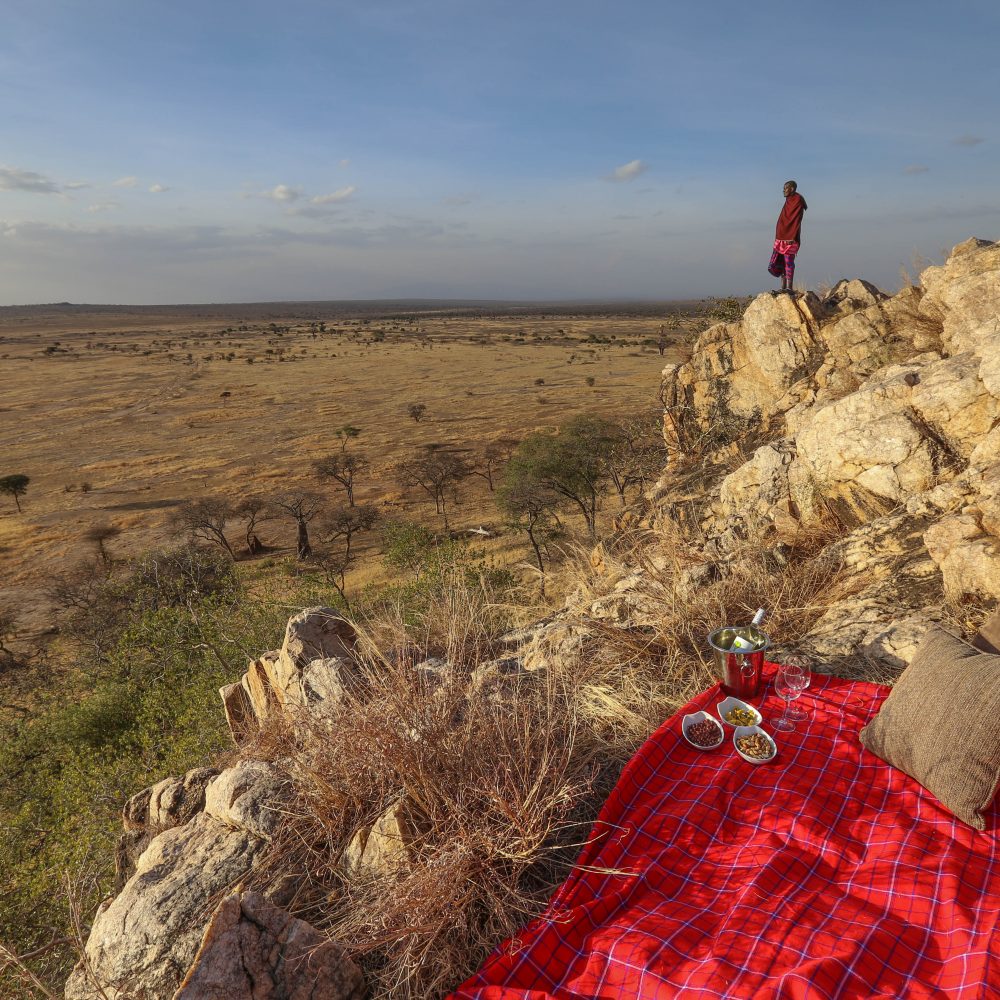 Masai standing on a ridge