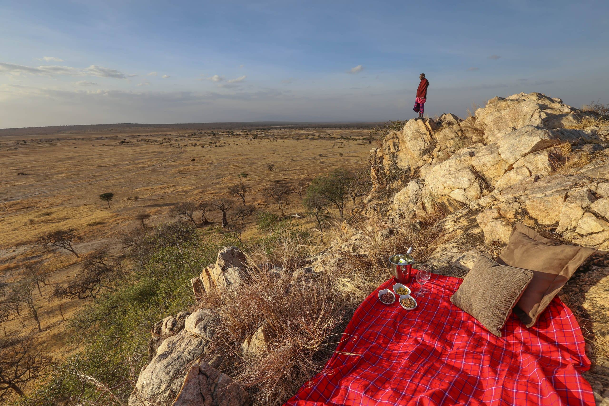 Masai standing on a ridge