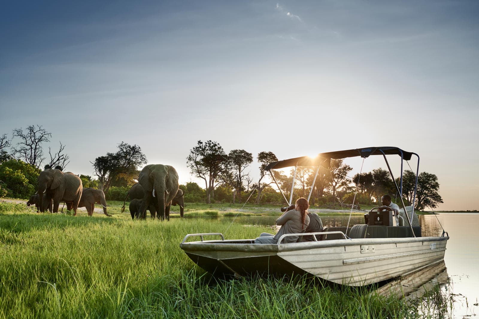okavango safari boat photographing elepants