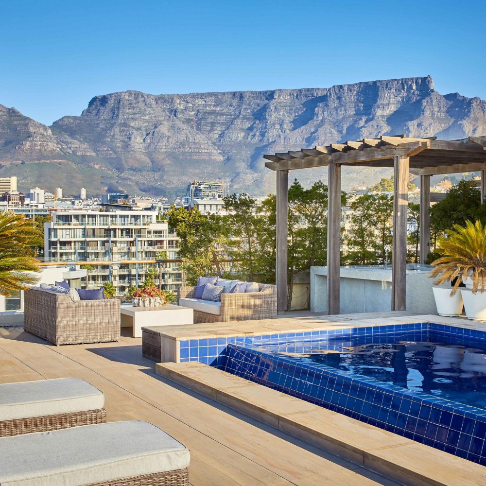 rooftop pool and deck with a view of table mountain in cape town